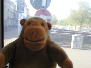 Mr Monkey on a bus in the outskirts of Brussels