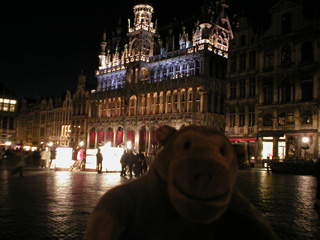 Mr Monkey looking at the Maison du Roi after dark