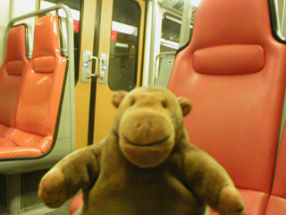 Mr Monkey in a subway train