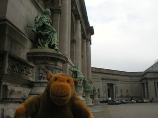 Mr Monkey beside the triumphal arch