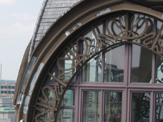 Detail of Art Noveau window arches on top of the MIM