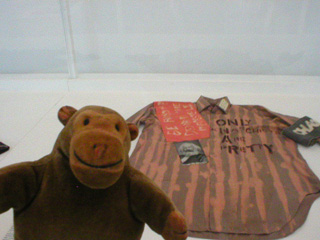 Mr Monkey examining a Seditionaries shirt