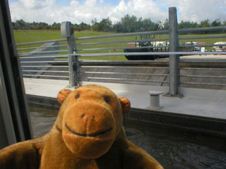 Mr Monkey looking out of the boat with the gondola at rest