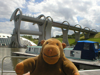 Mr Monkey looking Wheel and aqueduct from across the basin