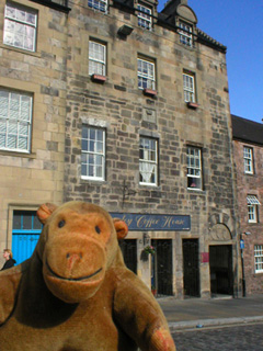 Mr Monkey looking at Darnley's house in Stirling