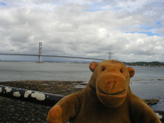 Mr Monkey looking at the road bridge over the Forth