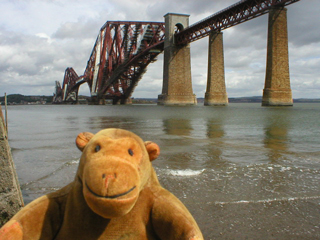 Mr Monkey on the beach below the rail bridge