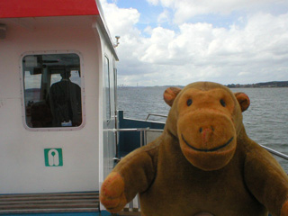 Mr Monkey beside the bridge of the ferry