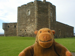 Mr Monkey looking at the outside of the castle
