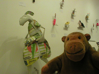 Mr Monkey with a collection of Lucy Casson sculptures