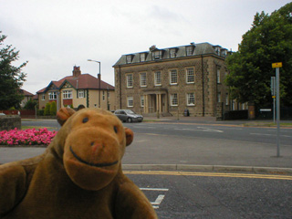 Mr Monkey across the road from the Masonic Hall