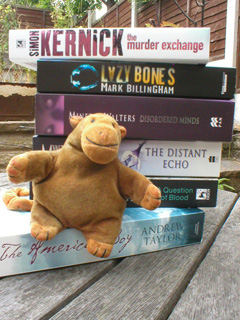 Mr Monkey with the books he won