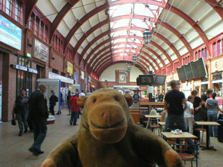 Mr Monkey in the main hall of the station