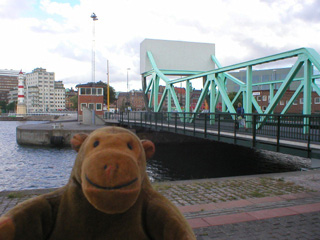 Mr Monkey beside the drawbridge