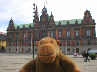 Mr Monkey looking at Malmo's town hall