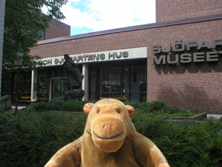 Mr Monkey outside the museum