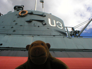 Mr Monkey looking up at the conning tower of the U3
