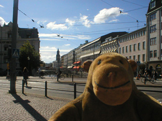 Mr Monkey looking up the street towards Brunnspark