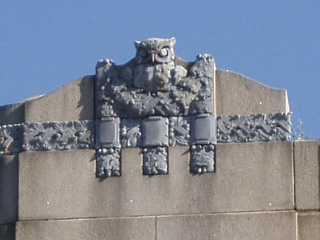 The sinister owl atop the university