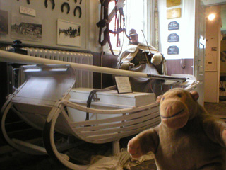 Mr Monkey examining a Swedish military sleigh