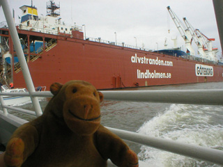 Mr Monkey passing a floating dry dock
