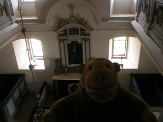 Mr Monkey looking down from the upper gallery of the church