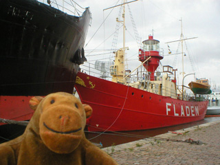 Mr Monkey looking at the Fladen lightship from the quay