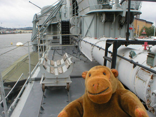 Mr Monkey examining the Småland's torpedo equipment