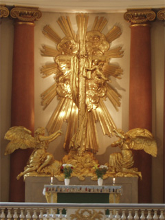 The gilded timber cross