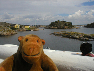 Mr Monkey looking at small islets in the archipelago
