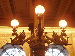 Dragons holding lamps on a pillar in the Börsen