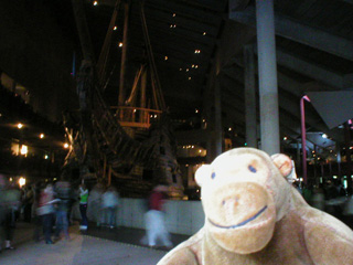 Mr Monkey looking at the Vasa from the main doors of the museum