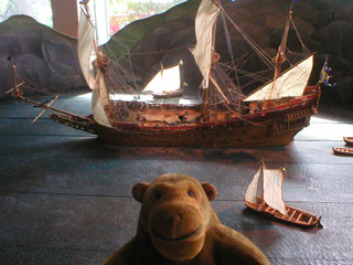 Mr Monkey examining a large model of the Vasa sinking
