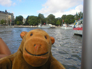 Mr Monkey aboard a boat leaving Nybrohaven
