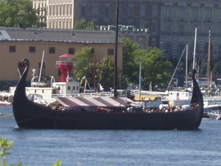 A replica Viking ship passing through Stockholm harbour