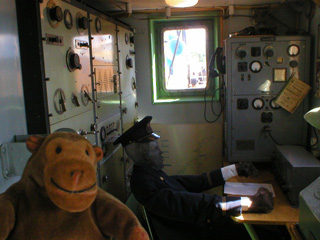 Mr Monkey examining the radio room of the Finngrundet