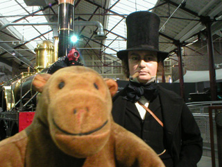 Mr Monkey in front of a replica of Isambard Kingdom Brunel