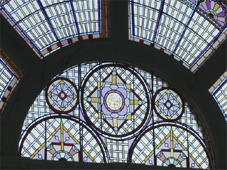 The stained glass above the large pool