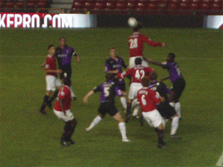 Players bouncing up and down to get the ball