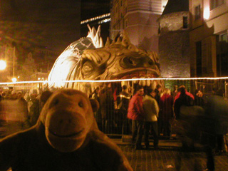 Mr Monkey watching people queue to go inside the Ice Monster