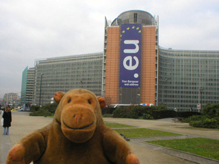 Mr Monkey looking at the Complexe Berlaymont