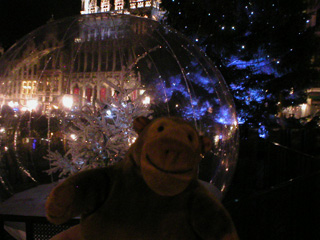 Mr Monkey with a tree in a plastic globe