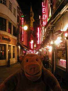 Mr Monkey walking down the Rue des Bouchers