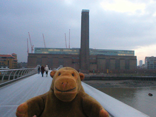 Mr Monkey crossing the Millennium Bridge to the Tate Modern