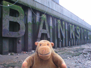 Mr Monkey in front of the letters BANKSIDE