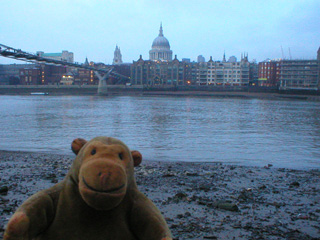 Mr Monkey looking towards St Paul's cathedral from the river bed