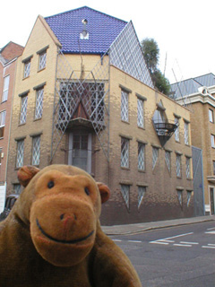 Mr Monkey looking at the house designed for Janet Street-Porter