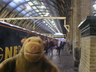 Mr Monkey about to get on a GNER train to Newcastle