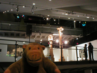 Mr Monkey running up the stairs to the Art Show at Urbis