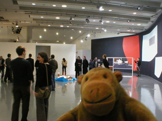 Mr Monkey watching people look at the Art Show at Urbis